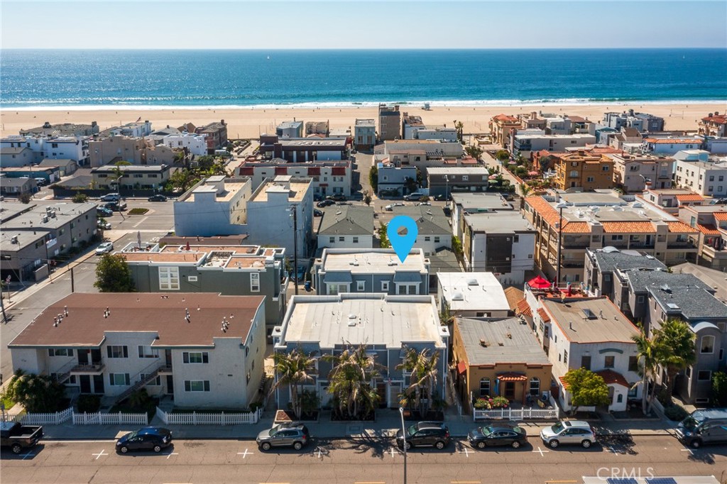Welcome to this fabulous, fully furnished Hermosa Sand Section home just steps to the beach, shops, restaurants, and the Hermosa Pier. Remodeled and updated, this home looks like a beachy postcard and is a joy to live in: light, bright townhome has three levels, two large bedrooms, and two and a half bathrooms with a large open family room with ocean views from the kitchen, balcony, and bedroom. This home boasts a big, sunny, west-facing balcony deck to enjoy the ocean breeze and spectacular sunsets. There is a large, private two-car, attached garage with a laundry area. Amenities include a front patio, en-suite bathrooms, off-street private entrance, high-end kitchen appliances such as a Sub-Zero fridge and wine fridge, Viking oven/range, Bosch dishwasher, and a built-in microwave. The home features modern, double-paned windows, a brand new roof, an AV system with built-in speakers, two decks, and two shared, off-street, guest parking spots. Start living the beach life and find out what Hermosa is all about!! To Live, Live by the Sea!