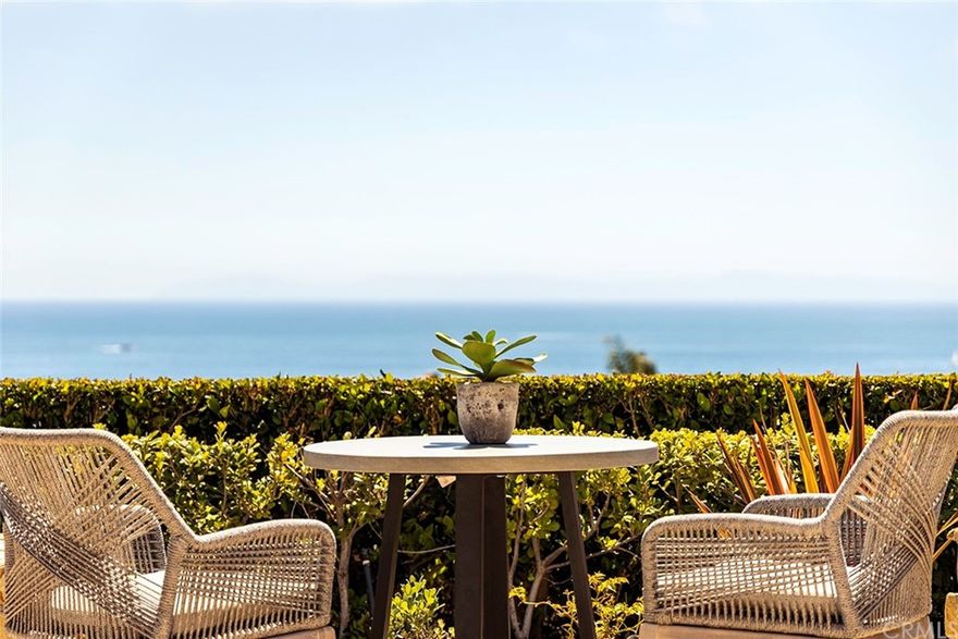 A contemporary Mediterranean seaside villa with main level master suite is the dream of coastal living coming true.  This newly renovated turnkey home offers 180 degree panoramic views of Pacific Ocean, Catalina Island, Newport Harbor, sunsets & city lights up the coast.  Lives like a single level with all the main entertaining areas on the first level including a great room with soaring ceiling, a gourmet kitchen, dining room, the master suite, a guest suite, and an office.  Upper level offers 2 bedroom suites and a bonus/exercise room.  3-car garage with built-ins.  This model perfect home has been transformed featuring a newly designed kitchen with Taj Mahal quartzite countertops, backsplashes, waterfall center island, 2 wine cellers (one temperature controlled).  The master bathroom features freestanding tub, quartzite countertops, backsplashes, tub surround, & vanity.  Set against the stunning ocean vista, the lushly landscaped grounds offer a salt water pool, spa with fire bowls, fountain, 2 outdoor fireplaces, a firepit, gazebo, BBQ.  Perfect setting for entertaining and Southern California living.