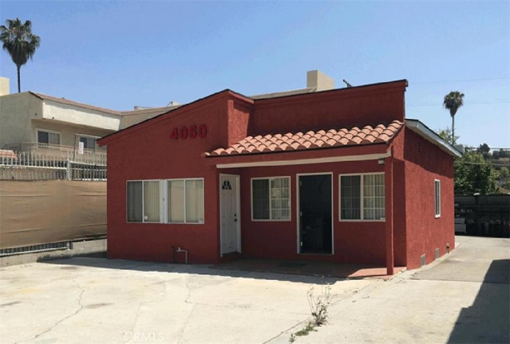 Don't miss this opportunity to invest in your own free standing commercial building. Offering you the possibility to use as two separate offices with convenient private parking spaces and storage area in the back. This property is also secured with private gates. Great location with visibility to brand your own business. This property offers many opportunities for use.