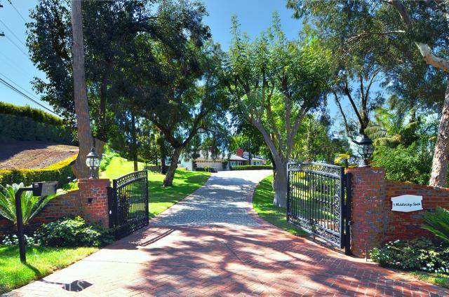 Inspiring Ranch Home with City Light View!!
One of the finest equestrian properties in the gated city of Rolling Hills. Offering a 6 stall Barn, Tack room, caretaker quarters and Hay storage area plus riding ring and lots of Paddock areas. There is a 3 car garage attached to the home plus an additional detached 6 car garage. The home offers 5,000 sq. ft., 4 bedrooms (easily converted to a 5 bedroom), spacious formal dining room, oversized family room and deluxe master suite. There is not enough room to list all the special features this home has to offer. A must see!