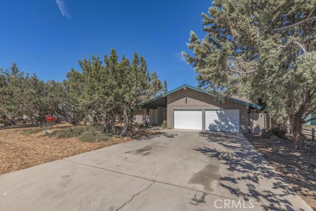 Beautiful home in hesperia. New Laminate flooring and new carpet in all bedrooms, new recess lights, new kitchen cabinets, new granite counter tops, with a custom mosaic tiled back splash. New garage doors , new exterior paint and custom two toned interior paint. Huge back yard. This is a for sale listing only, this property is not available for rent or lease. Association Amenities: Garage, Laundry # of RV Spaces: 0GARG,LAUN Lot Location Type: Standard Location Special Features: None # of Attached Spaces: 2 # of Detached Spaces: 0