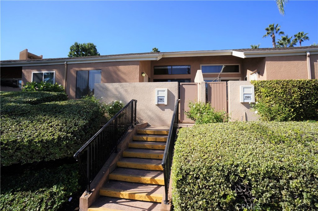 Lovely 2 Bedroom plus Loft/Office unit with a unique workshop/craft room off garage. This home has an upgraded Kitchen and 2 upgraded Baths. The Gourmet Kitchen has granite counter tops, stainless steel sink and newer appliances along with a sunny breakfast room. There is a large Living Room with a vaulted ceiling and fireplace. A Formal Dining Room is adjacent to the Kitchen. Up a few stairs is the Loft/Office area that could also be a third bedroom.There is a large Master Suite with updated cabinetry in the bath and a tiled shower private deck outside. There secondary bedroom is good-sized and located near the second bath which has an updated vanity. In the garage is a workshop/craft room and lots of storage cabinets. Excellent location near freeways and shopping. Sorry, No Smoking and No Pets.
