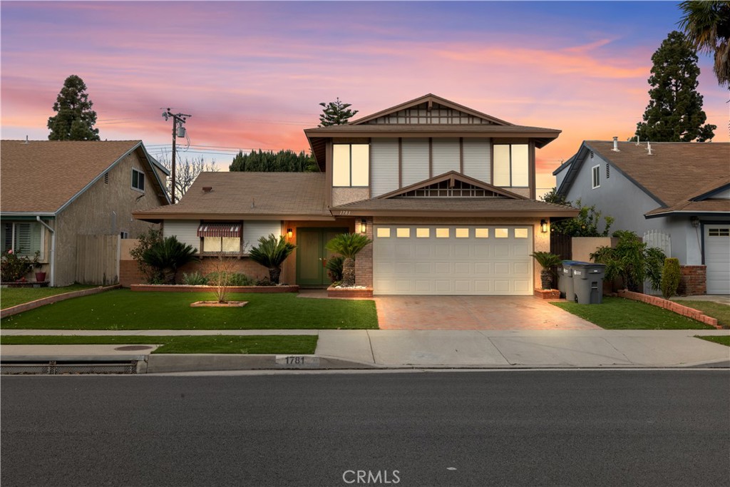 Welcome to this beautifully remodeled 3-bedroom, 2-bathroom home located at 1781 E. Cyrene Drive, Carson. This home has been completely renovated with new baths, new flooring throughout, and many other impressive upgrades and improvements. With 1,978 square feet of living space and a 5,194 sq. ft. lot, there’s ample room for both relaxation and entertaining. The downstairs bedroom is incredibly spacious, offering direct access to the pool and beautiful views, making it a serene and convenient retreat. The open and inviting floor plan features a cozy fireplace in the living room, with the added bonus of pool access from both the living room and the downstairs bedroom. The upstairs bedroom includes a walk-in closet, offering great storage and easy organization. Enjoy year-round comfort with central air and heat, while stunning hardwood and wood laminate floors flow throughout the living areas, with plush carpeted bedrooms adding warmth and comfort. The updated kitchen and bathrooms boast modern finishes, and the separate dining room is perfect for family meals and gatherings. The formal dining space complements the great curb appeal of the home, highlighted by double front doors. The master bedroom offers a private master bath, providing a peaceful retreat at the end of the day. Outside, the backyard is your private oasis, featuring a sparkling pool ideal for summer barbecues or cooling off on warm days. For added peace of mind, the home is equipped with a Ring camera system. Convenience is key with a 2-car attached garage offering extra storage space. Plus, with 5 freeway access, you’re just minutes away from other areas. This well-maintained, move-in ready home is waiting for you to make it your own – don’t miss out on this incredible opportunity in a great Carson neighborhood!