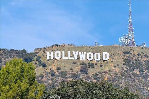 Photo of 6428 W Rodgerton Drive, Los Angeles, CA 90068 (MLS # TR25021801)