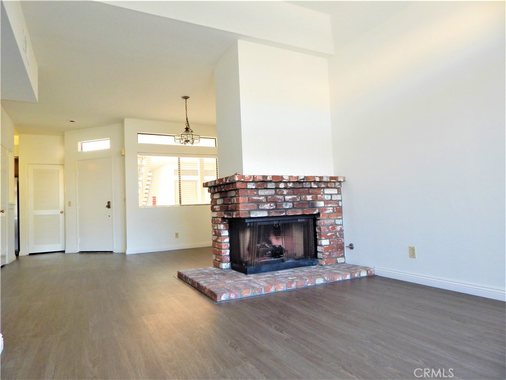 Resort-Style Amenities, Fresh Ocean Breezes! Just steps to the public trails @Bolsa Chica Wetlands/Mesa and just around the corner to the Pacific Ocean! Cozy Wrap around Fireplace in Living and Dining Rooms, two Sliding Doors lead to deck, Spacious Bathroom with Roman style tub and large Vanity Counter with Two Sinks. Newer, full size, Stackable Washer and Dryer included! Features Dramatic Smoothed Vaulted Ceilings. Unit is newly painted and has new vinyl plank flooring throughout. Cabo del Mar is Mediterranean-style resort living right at home! With Sparkling Pool & Spa, Sauna, Tennis and Indoor Racquetball Courts with Spectator Viewing, Clubhouse and Lush Grounds. Close to: Bolsa Chica Wetlands/Mesa, Shopping, Restaurants and the Pacific Ocean just 1.5 miles by car.