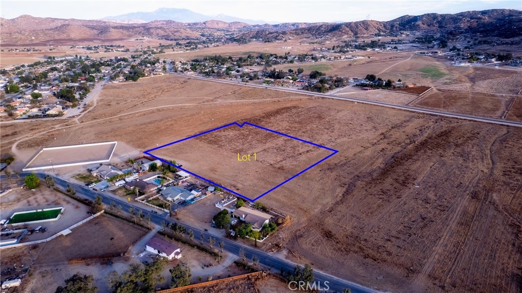 Enjoy the Tranquility of an Exceptional Location! Located at 0 11th St, Lot SVOL 1, this 5.29-acre parcel in the heart of Nuevo offers great potential, including the possibility for a lot split (subject to county approval). The property is mostly flat with some slope, making it perfect for residential development. Take in breathtaking mountain views and enjoy ample space for new construction or a permitted manufactured home, with horse property potential. The seller completed percolation tests for much of the subdivision years ago. The property will require a septic system and well. While the lot has not been surveyed, images provide an approximate location. Adjacent parcels are also available for sale, each sold separately. Don’t miss out on this unique opportunity! Seller financing available with a 35% down payment, an 8% interest rate, and a 2-year term.