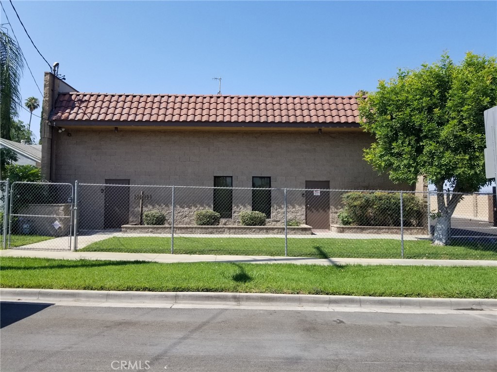 +5,000 SF freestanding building Completely upgraded with new furniture cameras and conference office new flooring freshly painted + approx. 1150 SF of office space 3 private offices remodel kitchen 2 bathrooms 3 12x12 ground level doors, 200 amps 3 phase power, M1 Zoning general industrial Zone 14 clear height close to 91/60/215 freeways Extra large warehouse completely fenced and secure new asphalt throughout open parking and yard with 13,939 SF Lot great for retail industrial/commercial business APN 219-124-013 Back in the Market