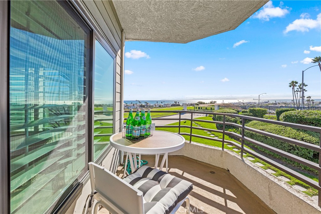 ***Just Reduced***Arguably some of the best views in Newport Beach at an amazing price! Chase sunsets all year long from the privacy of your own home! Exquisite ocean views greet you from every window, with panoramic views of Newport Pier, Lido turn basin, Lido Marina, Balboa Peninsula, Catalina Island, and Huntington Beach to the north. The daily sunset over the Pacific Ocean will mesmerize you as it turns into a sparkling city light view at night. Upscale Villa Balboa is the epitome of carefree Newport Beach living. Experience the gentle ocean breeze and beautiful Southern California climate. This magnificent three-bedroom, three-bath has windows wrapping around three sides to maximize ocean views from the living room, dining room, kitchen, breakfast nook, all bedrooms, and all three balconies. The elegant floor plan includes a formal entry with double doors and a built-in wet bar off the formal living room with a unique fireplace, 9-foot ceilings, and opens to the formal dining room. The two oversized primary bedrooms have large bathrooms, which include dual sinks, a soaking tub, a separate shower, and a private balcony with a stunning view. The third bedroom has a large window with a fantastic south-facing view. The single-level living makes life easy, and this lovely gated community is meticulously maintained. An elevator takes you from your car to your front door. With no interior steps, this home is ideal for view lovers of any age! The community offers a large clubhouse, a superb gym, tennis courts, pickleball court, two pools, two spas accessed by meandering trails that are a delight to walk. Nearby are world-class beaches, surfing, and walking paths. Sunset Ridge Park, a stunning 13.7 acres, sits adjacent, just across from Superior Ave. Enjoy picnics, hiking, dog walking, jogging & more, all with a panoramic ocean view. Close to John Wayne Airport, Toll Roads, quick access to L.A. or San Diego, Corona Del Mar, Crystal Cove, Laguna Beach, Dana Point, Huntington Beach, A+ Schools. This exquisite Villa Balboa condo is one property you don't want to miss. It is simply fantastic! Please use Superior/Nice Street gate to enter the property.