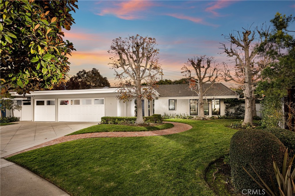 Welcome to 2800 Lighthouse, an exceptional single-story estate in the prestigious Broadmoor Hills community of Corona del Mar. Situated on an expansive 15,900 sq. ft. lot, this fully remodeled residence offers the perfect blend of modern luxury and timeless sophistication. Step inside to discover marble and French oak flooring throughout, complimenting the soaring vaulted ceilings and abundant natural light. The gourmet kitchen is a chef’s dream, featuring custom cabinetry, soapstone counters, Wolf & Sub-Zero appliances, and exquisite finishes designed for both function and elegance. The primary suite is a serene retreat, boasting a spa-like bathroom with a freestanding soaking tub, luxurious fixtures, and ample space to unwind. With four spacious bedrooms plus an office (or optional fifth bedroom) and three full bathrooms, this home offers flexibility for both relaxation and productivity. Recent upgrades include new windows, tankless water heater, HVAC system, ensuring comfort year-round. The private backyard oasis is a true showstopper, featuring a sparkling pool and spa, lush landscaping, and ample space for entertaining or enjoying the tranquil surroundings. Ideally located minutes from Corona Del Mar's world class beaches, award winning schools and premier shopping & dining.