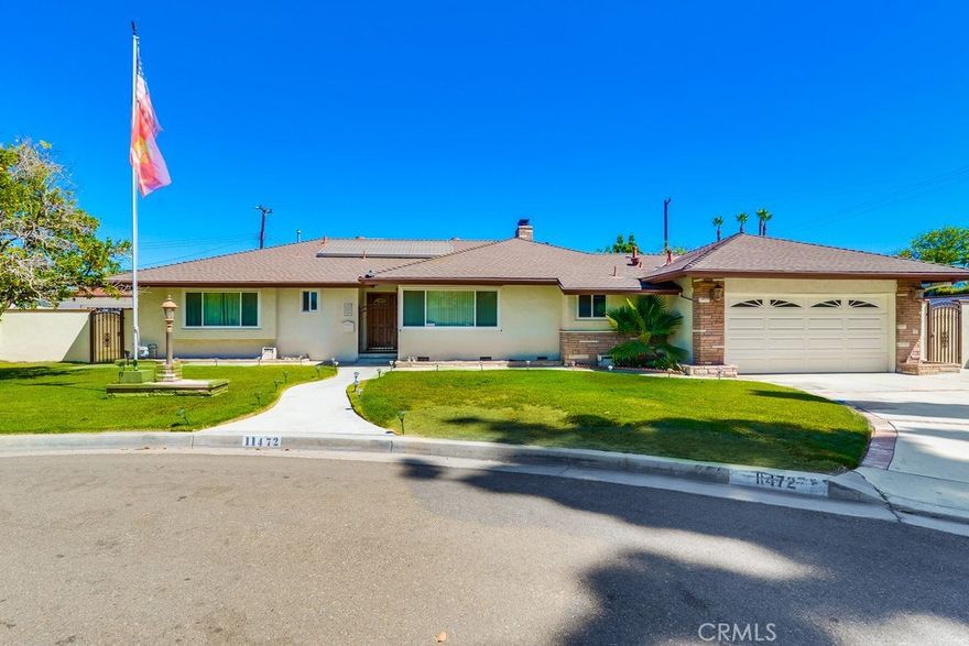 Welcome Home! This beautiful 3 bedroom, 2 1/2 bath home sits on a large lot in the quiet and beautiful neighborhood of Garden Grove. Located at the end of a quiet CUL-DE-SAC. Overlooking the living room is a spacious upgraded kitchen with granite counters that creates the perfect ambiance! This home has two fireplaces, one in the dining room and family room. As you walk through the master bedroom there is a private bathroom completely remodeled with a large bath tub and separate shower. The over-sized swimming pool and covered patio offers a perfect space for entertaining and enjoying days and nights. You will fall in love with the large entertaining backyard. Additional features include Water Softening System, Reverse Osmosis, ALL Kitchen drawers are soft closing, central A/C & heating and hardwood Floors. This is the perfect home for a family as it is conveniently located next to schools, parks, shopping centers and restaurants.