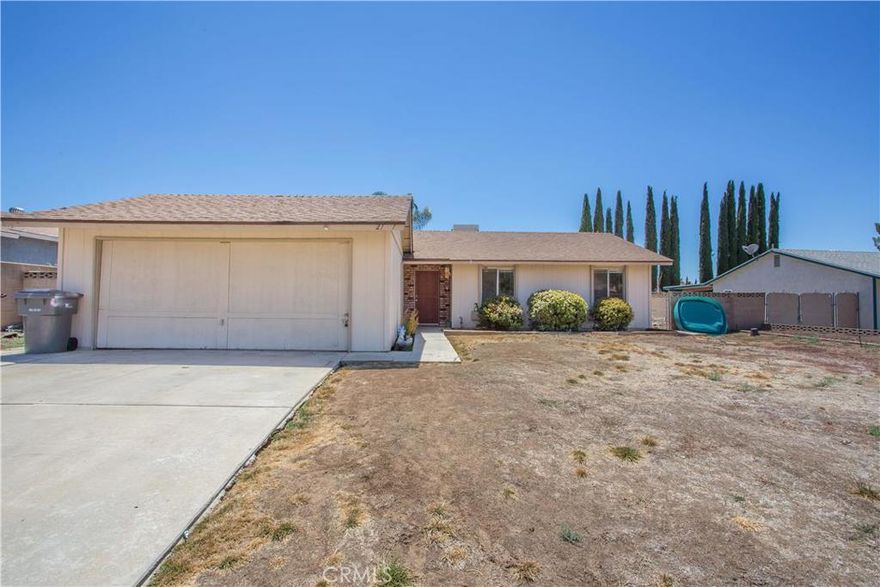 This is it, great single story 3 bedroom, 2 bathroom home in a prime cul-de-sac location!  Open floor plan with cozy brick fire place in the living room, spacious bedrooms, roomy closets, spacious backyard with concrete slab, block wall fencing, low maintenance landscaping, easy access to freeways and local shopping centers, No Mello-roos, No HOA fees! Priced to sell!