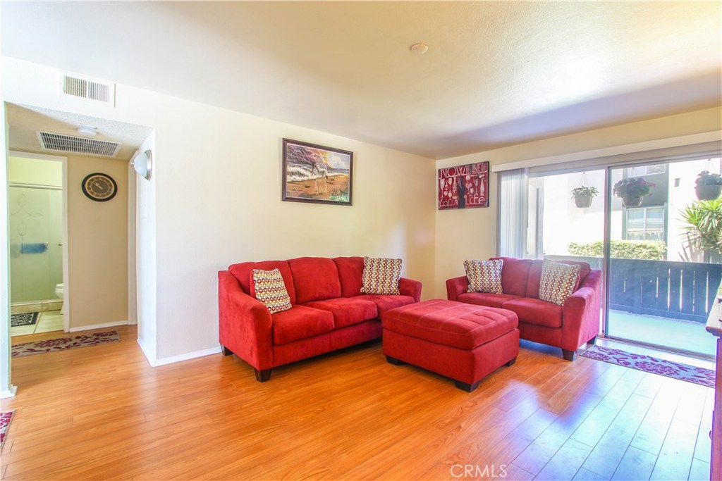 FANTASTIC OPPORTUNITY FOR FIRST-TIME HOME BUYER! SELLER SAYS EVERYTHING MUST GO! FULL PRICE OFFER GETS LIVING ROOM FURNITURE, BEDROOM FURNITURE, OFFICE DESK/HUTCH AS WELL AS ALMOST NEW STAINLESS STEEL FRIDGE AND NEWER WASHER/DRYER! COMPLEX IS FHA APPROVED! Just move right in! This ground level condo has 2 bedrooms with 2 full baths! Gorgeous kitchen is light and bright with new white cabinets on lowers, marble counters and flooring with 2 newer fans! Almost new stainless steel refrigerator included! Relax on your choice of 2 patios! Very spacious in back with direct access to carport. The front patio brings in sunlight to the living room. Almost brand new Samsung washer & dryer included in full purchase price and easily accessible in the locked laundry closet on the porch. Association pays water and trash. Enjoy the community clubhouse and pool. Close to freeway, shopping and schools.