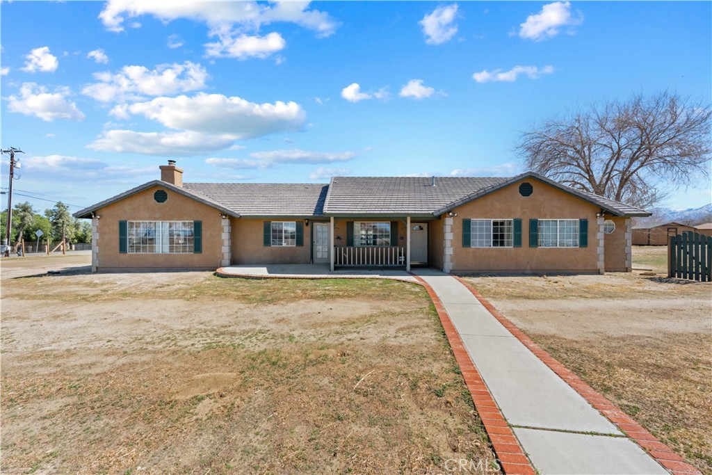 Welcome Home! This beautiful ranch style estate is situated on a 1 acre corner lot and offers over 2,500 square feet of living space. PAID SOLAR PANEL system basically eliminating your electric bills!!! Large family room with vaulted ceiling and a cozy wood burning stove accented with a brick hearth. Huge center island kitchen with breakfast bar, upgraded laminate flooring, large pantry and plenty of cabinet space. Formal living room plus TWO BONUS ROOMS perfect for an office and/or craft room. The primary retreat has crown molding, walk-in closet and it's own private bath with separate shower and jacuzzi tub, Other features include a Jack and Jill bath, indoor laundry with sink, huge SOLAR panel system, 3 car attached garage and a large attic space with a pull down ladder to a SECRET ROOM. The backyard has an inground pool with a covered patio, built-in BBQ, block wall fencing and 3 large storage sheds. **MASSIVE** 2,847 sq ft detached garage built in 2017 with 2 roll-up doors, 1/2 bath with it's own septic, bar area with sink, evaporative coolers, ceiling fans and a built-in air compressor! Plenty of room for all your toys OR convert into an ADU! Conveniently located just off Pearblossom Hwy in a quiet and well established neighborhood. This is truly a MUST SEE home!