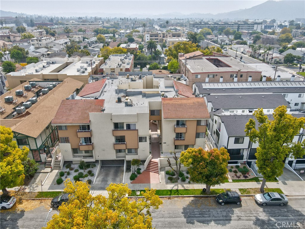 Nestled in a prime location, this pride of ownership property is offering an exceptional unit mix of 18 spacious two-bedroom / two-bathroom units, with five units featuring an additional den. All units have individual water heater and in-unit washer/dryer.
Built in 1989, this property is subject to State Rent Control AB 1482 which allows for 8.8% annual rent increases.
Opportunity to legalize three existing ADU 0+1 units offering additional streams of income and maximizing the property's investment potential making it a 21-unit building.
Property is equipped with Intercom access and gated secure parking, providing residents with peace of mind and ease of access.
**There is an assumable $4M Chase loan at an attractive interest rate of 3.15%, maturing on April 20, 2026.**
This meticulously maintained property, coupled with its prime location, attractive unit mix, potential for additional income, and favorable financing options, presents an outstanding investment opportunity in Glendale’s vibrant real estate market.