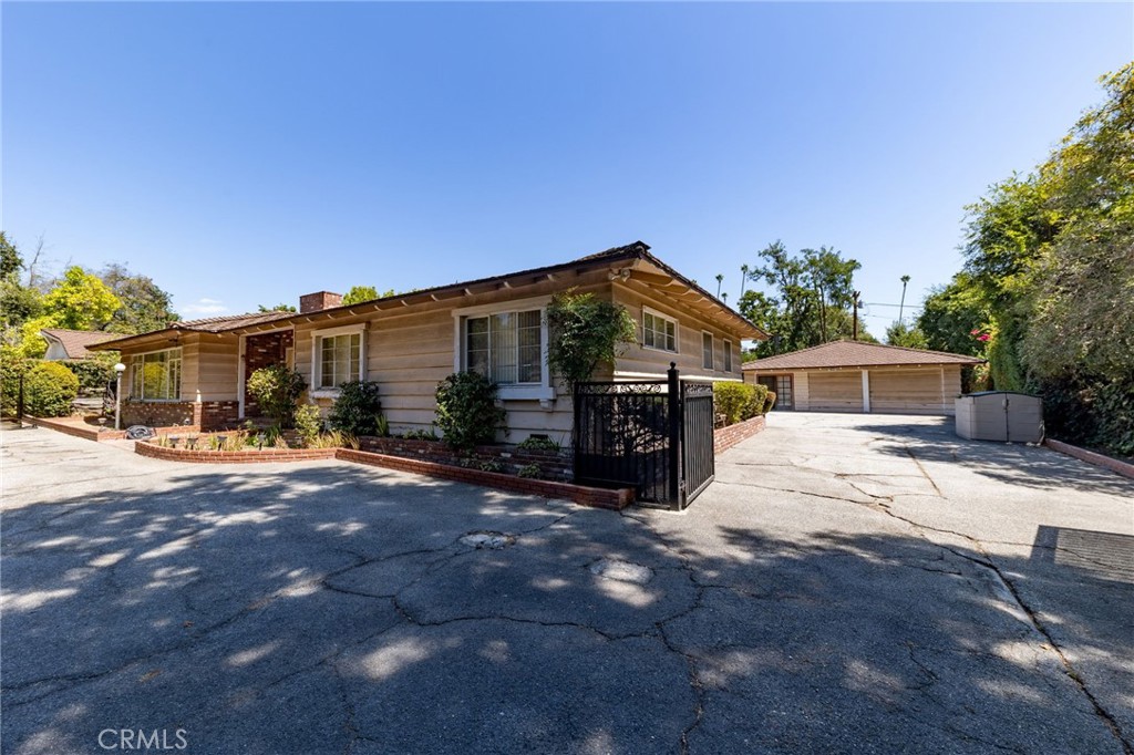 This is perfect opportunity to add this house bigger or start over with brand new construction. Don't miss this charming ranch house in the central of San Marino. Nestled on a quiet tree lined street, 3 bedrooms and 4 bathrooms home boasts 2369 sqft of living space on a 25775 sqft large lot with over 100 feet of street frontage. Step entry you will be charmed by the large, gracious living room with a fireplace. Down to the hallway, the master bedroom with the upgraded bathroom and the other two good size bedrooms, shared bathroom. Family room offering picturesque views of the landscaped rear yard with a sparkling pool and mature trees. Previous owner added the bedroom and bathroom behind the garage. Great location in very quiet street, private lot with two gated front and back driveway. Located just a block away from the Crowell Public Library, Valentine Elementary & Huntington Middle Schools and close to shops, restaurants on Huntington Dr. You can make your dream home.
