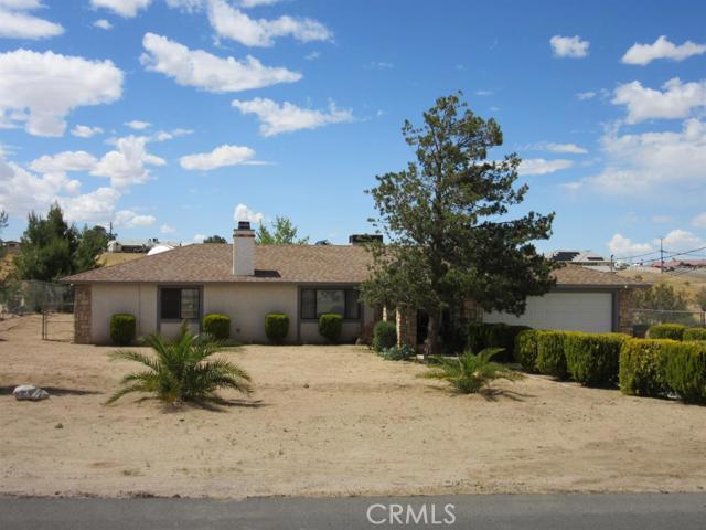 POOL HOME ON 1 ACRE of HORSE PROPERTY Very Clean Home with Many upgrades. This Fine Home Features Three Bedroom and A Large Game room with Fireplace, Two Custom Remodeled Bath Rooms, Great Room with Pellet Stove in Fireplace, Formal Dining area, Remodeled Kitchen with Quartz Counters and Glass Mosaic Back splash, Nice Stainless Steel Appliances in Kitchen as well as a Nickle Steel Sink. You'll Love the Cozy Covered Rear Patio and Koi Pond with Waterfall that accents your own back Private Oasis. The slump stone Block walls & Lots of concrete decking that surround the Pool area make this a quite place to relax and enjoy the sound of the Waterfall while BBQing with Family & Friends. When your Ready for some indoor Fun, just step into the 30 X 20 Game Room for some Family Game Time. This Home also has Indoor Laundry room with lots of Cabinets, A Garage work area, Breeze Way Room off Master Bedroom with access to Game Room and MORE. There are some critter Pens out back for your Animals of choice and Lots of area for Horse's. Gated RV Access on Side of Home to Fenced Rear yard of Property and a Observatory out back for The Star Gazer Hobbyist( just needs a telescope). A Must come see Home with Upgraded Tile and Travertine Flooring, Newer 30 year roof, New Trane HVAC system and Ducting, the list goes on. Check out the pictures and this home TODAY