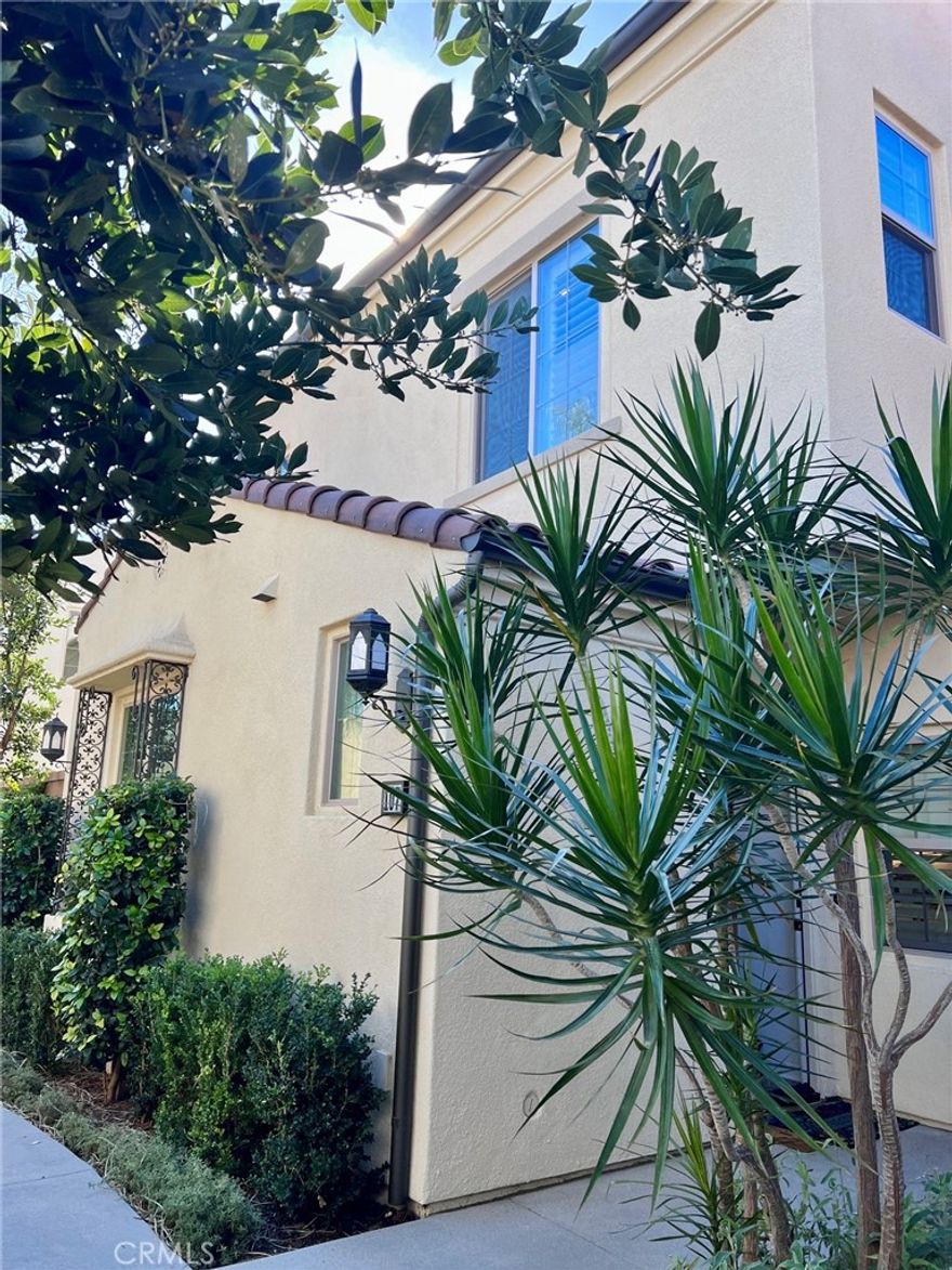 Beautifully home in desirable Portola Spring.  Highly upgraded luxurious vinyl plank flooring through out the entire downstairs and upstairs. Plush carpeting for the stairs. Plantation shutters through out. Custom built-in cabinet for downstairs living room area and gourmet kitchen with upgraded counter & backsplash plus an island. Dinning area has sliding door with custom drapery. Nice outdoor patio outside of living room area. A spacious loft upstairs, upstairs laundry room with side by side washer & Dryer and a Barn Door. Master bedroom with two separate closets, dual sinks and a bran door for privacy. Two car garage with over hang storage racks. The property also has water filtration system through out .The association provides numerous parks, pools and children's play ground. The home is conveniently located near Spectrum and Great Pak area. A great place to come home to.