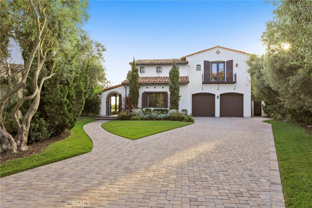 Ideally situated on one of the most coveted corner lots in all of Crystal Cove, this sprawling 20,000 sq ft lot + offers privacy, space, close proximity to community amenities and sensational views from the second level. The long estate driveway leads you to this highly-upgraded, meticulously maintained home, offering spacious living & seamless flow between the formal & informal living spaces. Interior highlights of this five bedroom, four and one-half bath home include a generous chef's kitchen with professional-grade appliances, 306 bottle climate - controlled wine cellar, large family room with vaulted ceilings, spa-like master bath featuring a steam shower and dual walk-in closets, and a large great room. The expansive rear yard is comprised of a 1,000 sq ft salt water pool with water jets, fire pits, outdoor living room with BBQ & bar, sand volleyball court and a sprawling lawn. Additional highlights include whole-house audio-visual system, central vacuum, and finished 3-car garage. Residents of Crystal Cove enjoy world-class amenities, including 24/7 guard-gated and patrolled security, The Canyon Club, tennis, swim, and fitness facilities, numerous parks, access to pristine hiking trails, and close proximity to the Crystal Cove Promenade and Crystal Cove State Beach.
