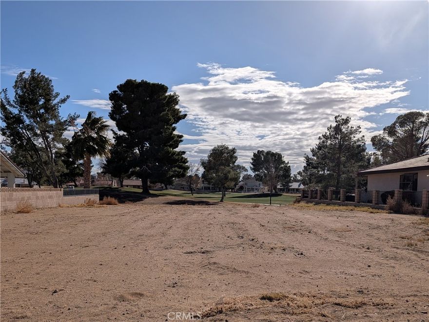 OWNER WILL CARRY!!!  Beautiful vacant lot located on this 27 hole golf course.  Gorgeous sunsets in your backyard are what you can look forward to in the evenings.  Drive by to see where your next house will be built.  35% down, 10% interest within 3 years.