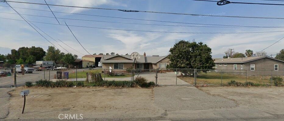 2 Properties sold together. 19474 and 19488 Jurupa Avenue. Currently 1 residence on each parcel, totaling approximately 3015 square ft with 6 bedrooms, 5 bedrooms., on approximately 1.65 acres. Both residences have attached garages. There is also a workshop in the rear of the yard that was previously used as a feed store and hay barn. Corner leveled lot currently in county, great for pull through from Jurupa Ave to Lilac Ave. Potential Industrial within county or annex to City of Rialto.