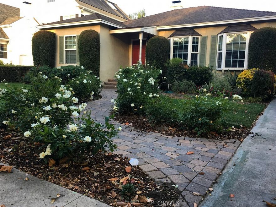 Here is your chance to live in Colfax Meadows — one of the most Charming and Desirable Neighborhoods in L.A! Located ideally close to Tujunga Village and Ventura Boulevards’ shops, restaurants and entertainment. A beautifully landscaped front yard welcomes you home with an open living space, wood flooring throughout, Fireplace, two large bay windows & a dining area. The bright kitchen has granite counter tops, appliances, & laundry area. Just off the living room are two ample bedrooms with a hallway bathroom that features double sinks with a separate shower & tub. The cozy Den leads the way to the Master suite complete with 2 closets, and an attached "room" ideal for sitting or gym area; a sumptuous bathroom with double sinks and soaking tub. The rear yard is perfect for entertaining with its large patio & large grassy yard. Truly a "Home Sweet Home"!