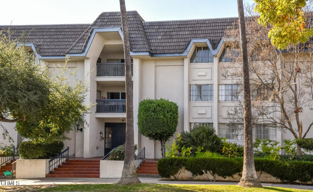 Ideally located in the heart of Pasadena, adjacent to the much sought-after Madison Heights neighborhood is this first-level, turnkey, 2 bedroom, 2 bathroom condo with close proximity to the Pasadena Playhouse, South Lake shopping and restaurants, the world renowned California Institute of Technology, and Pasadena Old Town. The spacious living room features a large window that allows for natural light, laminate floors, recessed lights, and a cozy gas fireplace that is great for entertaining and gatherings. The dining area is next to the modern and stylish kitchen that showcases gray quartz countertops, bright white soft closing cabinets and stainless steel refrigerator, stove, microwave and dishwasher. The hallway 3/4 bathroom features a corner shower with glass enclosure, a mirror, and a vanity with storage. The first bedroom features glass mirrored closet door and a dual pane slider door that leads to the patio grounds. The primary bedroom offers laminate flooring, a ceiling fan light fixture, two closets, a large dual pane window and a door that leads to the back patio. Attached to the bedroom is the full bathroom that has a quartz countertop, and a tub with shower. There are many conveniences to love about this home, its proximity to the elevator, the community laundry room located on the same level and the spacious courtyard that is located in front of the home that features a community BBQ area and patio tables, making entertaining a breeze! HOA fees are $547.91 per month and include: electricity, gas, water, trash, earthquake insurance, common area and maintenance, 2 tandem parking spaces and a storage bin.