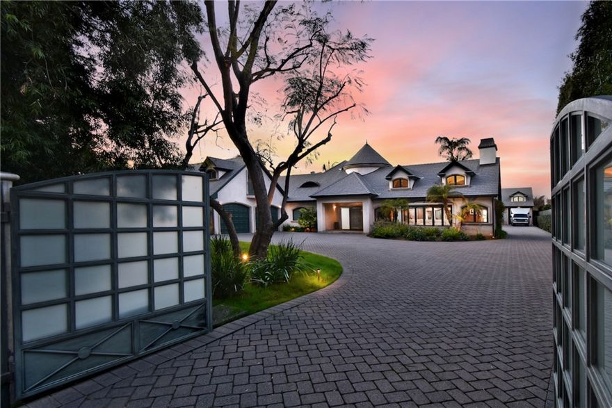 The Ultimate Luxury Retreat in the Heart of Sherman Oaks. Welcome to a Beverly Hills-inspired sanctuary, where privacy, prestige, and unparalleled

craftsmanship converge. Nestled behind gates on an expansive two-thirds-acre lot, this custom-built masterpiece is making its debut on the market. Spanning over 5,500 square feet, every inch of this home has been meticulously designed with no expense spared—a true statement of sophistication.

Grand Living, Elevated Elegance. This 4-bedroom, 4-bathroom on the estate is predominantly single-story, offering an effortless flow of light-filled, grand-scale living spaces. The exceptions? A sprawling bonus room/gym/office perched above the attached 3-car oversized garage with plenty of built in

storage, adding an extra dimension of luxury and functionality. Every detail has been curated for style and comfort—from the hidden home theater, designed for the ultimate cinematic experience, to the James Bond-inspired private office, where sophistication meets intrigue. Each room is perfectly proportioned, exuding warmth, elegance, and timeless charm. Endless Possibilities &amp; Extraordinary Amenities in this Detached 2,100+

Structure.

~ Massive 6-car garage featuring 20+-foot ceilings, ideal open space for training,

rehearsals, or studio office space, with parking.

~ Attached 1-bedroom, 1-bath guest suite with private entrance—perfect for visitors or

extended stays, including an upstairs loft area 640sf

~ Separate rear-street walk-in access, offering potential for an ADU conversion,

business space, or private retreat

Outdoor Paradise – A Dream for Entertainers

This resort-style estate is designed for seamless indoor-outdoor living, with expansive grounds that set the stage for unforgettable gatherings:

~ Parking accommodates up to 18-20 vehicles - a rare find in Los Angeles

~ Spectacular swimmer’s pool with a swim-up bar and spa, evoking a five-star resort

experience

~Lush, oversized grassy yard, perfect for hosting lavish parties, family celebrations, or

serene evenings under the stars

A residence of this caliber and distinction rarely graces the market. This is your once-in-a-lifetime opportunity to own a true custom estate in one of Los Angeles’ most coveted

neighborhoods. This masterpiece won’t last!
