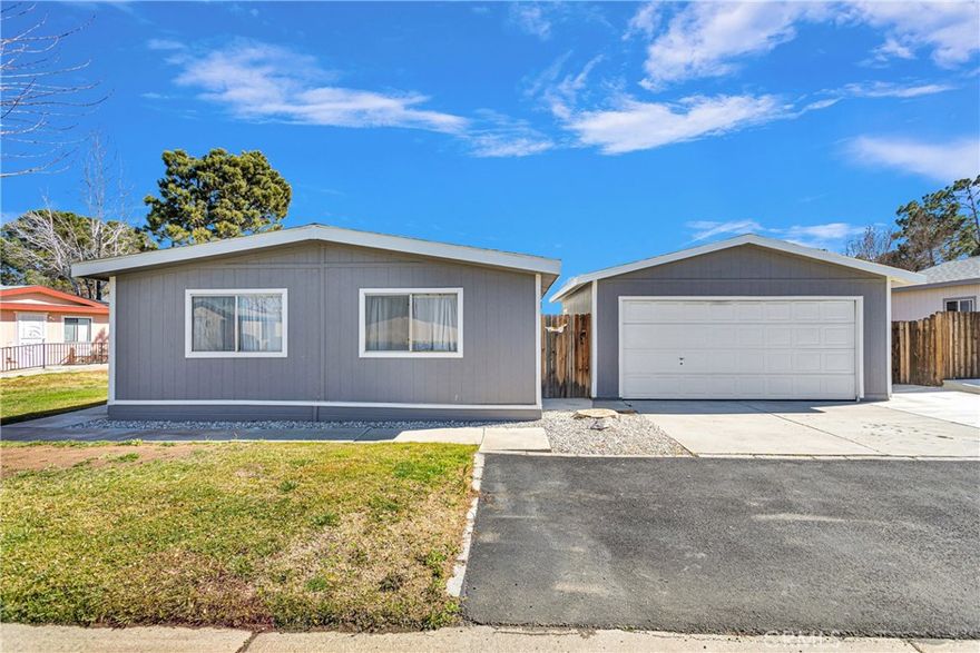 WELCOME TO THE TRANQUIL 55+ COMMUNITY OF MOUNTAIN VIEW VILLAS IN APPLE VALLEY.......This Manufactured Double Wide Home has a brand-new Kitchen with Granite Counters and New Cabinets, New Paint, New Flooring, Huge separate laundry room, Separate Dining room and 2 Bedrooms, 2 Baths with a Den and is 1344 sq/ft. Located in a Beautiful tree lined senior park. It is located on the greenbelt at the end of the cul de sac. Separate double garage with door opener. Close to Shopping and Park offers lots of Amenities and Activities BONUS Huge Back Yard you won't find in any other park. Washer/Dryer negotiable. 12x12 concrete patio. Bus service. Community amenities include a clubhouse with a pool, spa, shuffleboard court, billiard room, library, and fitness center. Residents can also take advantage of RV/boat storage, an onsite office with staff, planned social activities, bingo nights, and Thursday coffee with donuts. . Don't miss out on this fantastic opportunity!

Buyer must be approved by Park before Closing. All information deemed reliable, but not guaranteed. Buyer and buyer’s agent to do own due diligence.