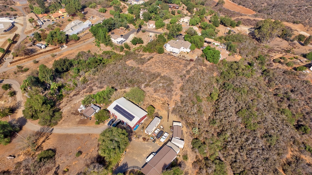 Unbelievable deal on these two parcels combined for this 3.77 acres building site. Great views looking north to the San Luis Rey valley. Rural living yet minutes to downtown Vista. You will love driving down this quaint private road entering into this "hidden valley" that few locals even know about. Located just below Elevado Hills Estates. If your clients want peace and tranquility then this is the lot for them. Front lot APN: 171-110-22-00 Neighborhoods: Warmlands Other Fees: 0
