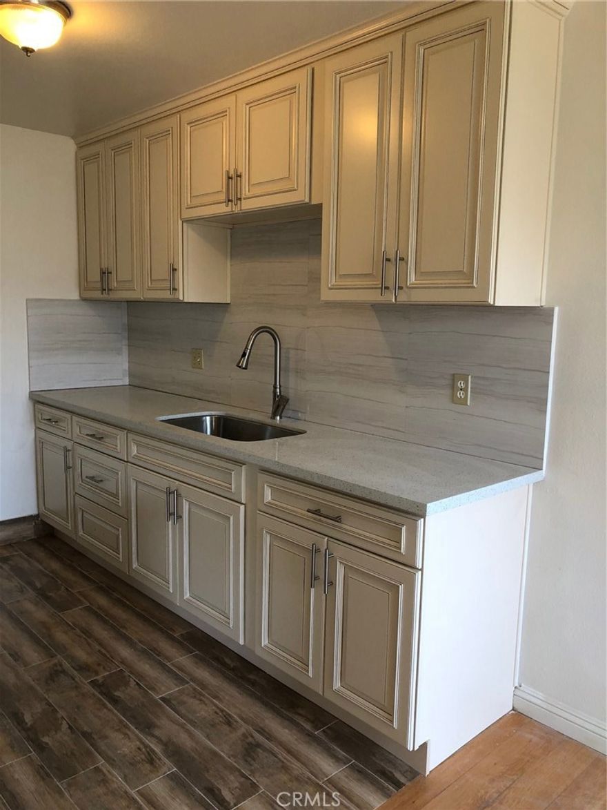 This one bedroom one bath apartment Condo with one carport parking space. New remodeled kitchen and bathroom. Central AC. Laminate wood floor and tile floor. Excellent move in condition. Community pool. spa and tennis court.Walks to supermarket and shops. Close to park and 60 freeway. good convenient location.