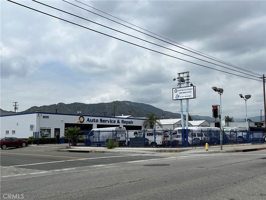 Free-standing automotive building located on a signalized intersection on the highly trafficked Foothill Blvd in Azusa. Successful automotive business operating for over 20 years at this location. Business, equipment and building included in the sale. Renovated less than three years ago with newer equipment, renovated office area, fresh paint on the interior and exterior. There are 3 double wide bay doors 19'x10', 5 hoists, diagnostic machines, compressor, a new 18K Pound Hunter alignment machine, benches, tools, etc. The interior clear height is 13 feet. It has a large fenced yard area with parking for over 20 cars. Parking included along the side of the building as well. The office area is approximately 700 Sf with two restrooms, waiting area for customers and an open work area. A service counter is located in the shop area. Excellent building and Pole signage with high visibility to over 20K cars daily! Located on the border of Irwindale near Costco. Close access to the 210 and 605 freeways. Zoning DWL- West End Light Industrial which allows industrial, automotive and retail. Check with city for possible uses. Great opportunity to take over an established automotive business with a great reputation in the community.