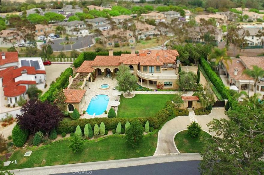 This Tuscan estate is crafted with the most exceptional & stunning of materials. Enjoy complete privacy on over 31,000 square feet of magnificent land.  This villa is located in Cotton Point Estates behind three sets of gates.  Once inside, you have entered onto one of the most exceptional homes found anywhere on the planet.  Every inch is grand, starting with high ceilings, majestic arches, gold leaf detailing, & antiqued woodwork.  The entry room has a domed ceiling & walls finished in Venetian plaster. The floors are limestone with an elegant stone medallion centerpiece.  Step into the massive great room with its Count Rumford fireplace and three sets of doors that lead to a portico & wall of original artwork.  The game room features both a hand-carved Honduran cherry wood billiards table and an original poker table from a 1960's world series poker tournament in Las Vegas.  For outdoor entertaining, cook a special feast in your own pizza oven and "big green egg" smoker.  The casita has its own full kitchen.  The property is located 75 feet above the sea and just a few feet more to touch the sand.  The private beach features world class surfing.  Cotton Point is also home to Pres. Nixon's Western White House.