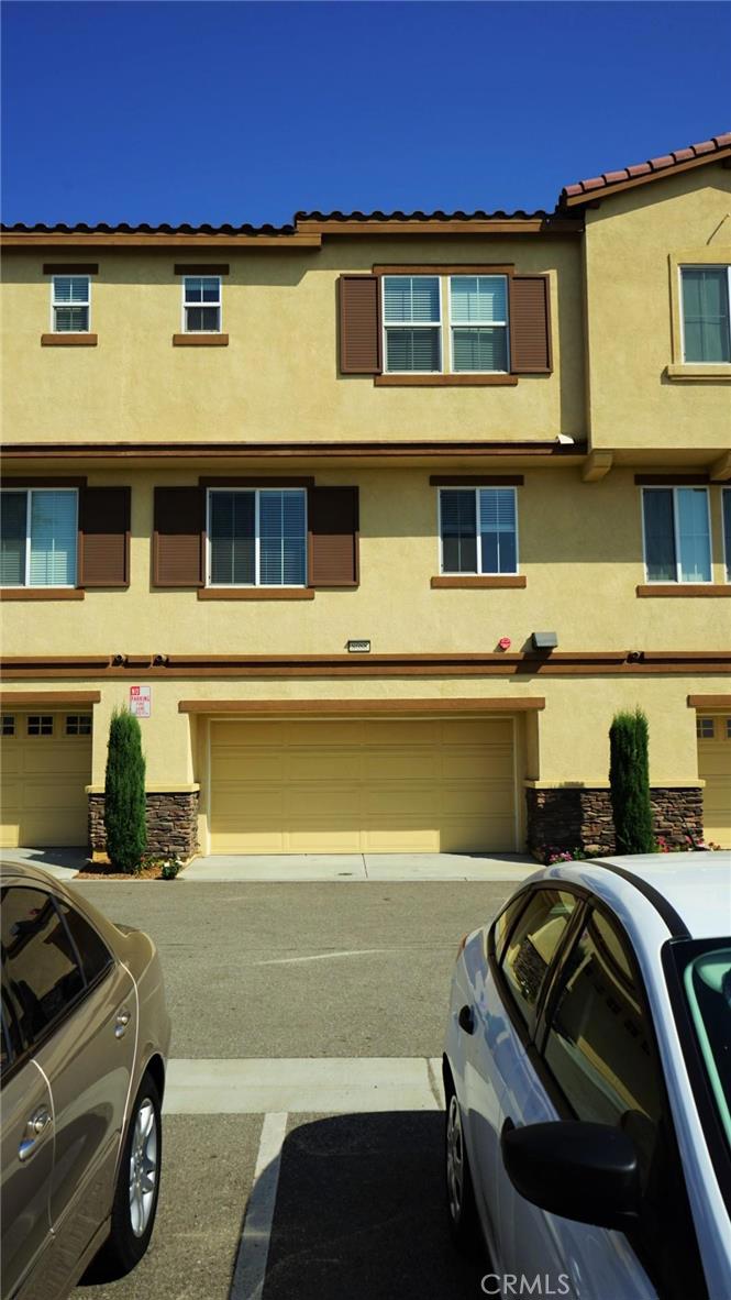 Beautiful Rancho Cucamonga Condo! This lovely home has a great open layout, very modern look with upgraded flooring and kitchen. This home will not last and the pictures speak for themselves. This is a must see in a desirable Rancho Cucamonga Area. Condo was built in 2013 fairly new with a beautiful gated community with a pool, peaceful landscape and direct access to the Great Pacific Trails of Rancho Cucamonga. Perfect home for any family! Walking distance to restaurants and shopping. 2 car attached garage with a bonus room that which can be used as a third bedroom or office. Enjoy the community features, outdoor patios, bbq’s, playground and a pool for those hot summer days. Don’t miss out.