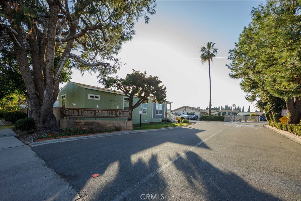 Welcome to A Large Mobile Home in Anaheim border of Garden Grove with 3 beds/2 full baths, Living area Appx 1920 sqft which offered large living room , family room and mini bar, newer laminate flooring throughout, newer A/C, 2 side new patios, newer windows, 4 parking spaces, back yard and community pool, in house washer and dryer hooked up. Lowest lease around this area $1,100 monthly. It is conveniently close to all freeways, great shopping, supermarkets, offices, schools, dining..and more!