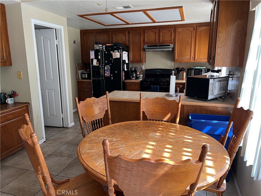 Photo 10 of 41 of 15576 Guajome Road house
