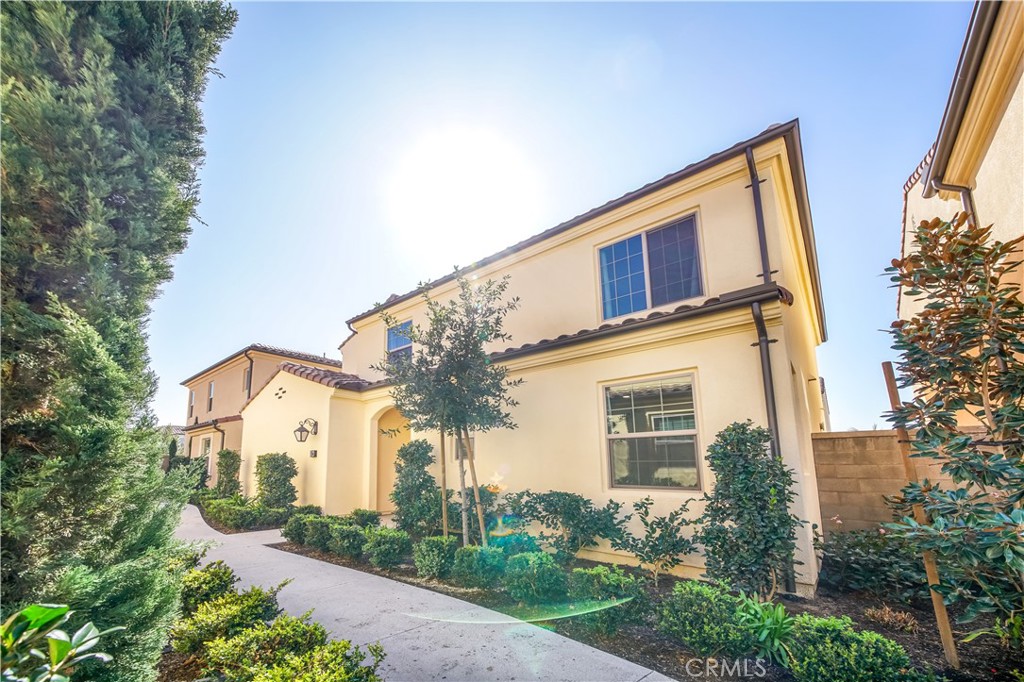 Welcome to this beautiful home located in Cypress Village, newly built in 2019 with 4 bedrooms and 3.5 bath plus LOFT. As you enter, there is a convenient main floor bedroom with an ensuite bathroom on your right, which is perfect for a guest room or office. Walk to the left, you'll find this home features an open kitchen with an abundance of counter and cabinet space. Spacious living room with high ceilings, and tons of windows to let in the natural light, making your home warm and bright. Three bedrooms including the master suite and a loft are up. Bring your bags to settle with family at one of the most convenient location in Irvine. Enjoy the short walk to the parks, clubhouse and community pool. Just a few minutes walk to the world famous ice rink and the nearby hiking and biking trails. Also close proximity to shopping center, schools, and the Great Park.