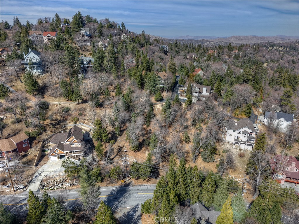 Prime Vacant Lot Near Tavern Bay. Build your dream home. This exceptional vacant lot, located on the sunny side of the Lake! Close to Tavern Bay Beach club, offers the perfect opportunity to build your dream mountain retreat. Oversized lot, upslope from North Bay, property comes with preliminary plans and soil report, making the building process a little smoother. The plans had access from North Bay with a two car garage. The lot is surround by newer homes on both sides. Don't miss this rare cahnce to own a premium lot in a sought after location.
