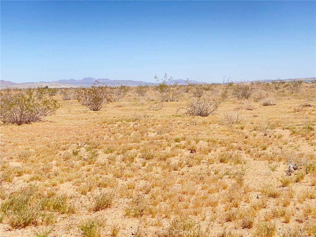 +_ 17.93 acres unimproved land parcel zoned RL-5 ( Rural Living -5ac minimum) situated in an Unincorporated area of San Bernardino County, North East of the City of Adelanto city limits. . With frontage on Helendale Rd and West border Topaz Rd. Located close to HWY 395, as well as The Southern California Logistics Airport. Huge growth potential for this undeveloped swath of land between HWY to the west and The Mojave River to the east. Excellent opportunity to invest and hold for impending development.