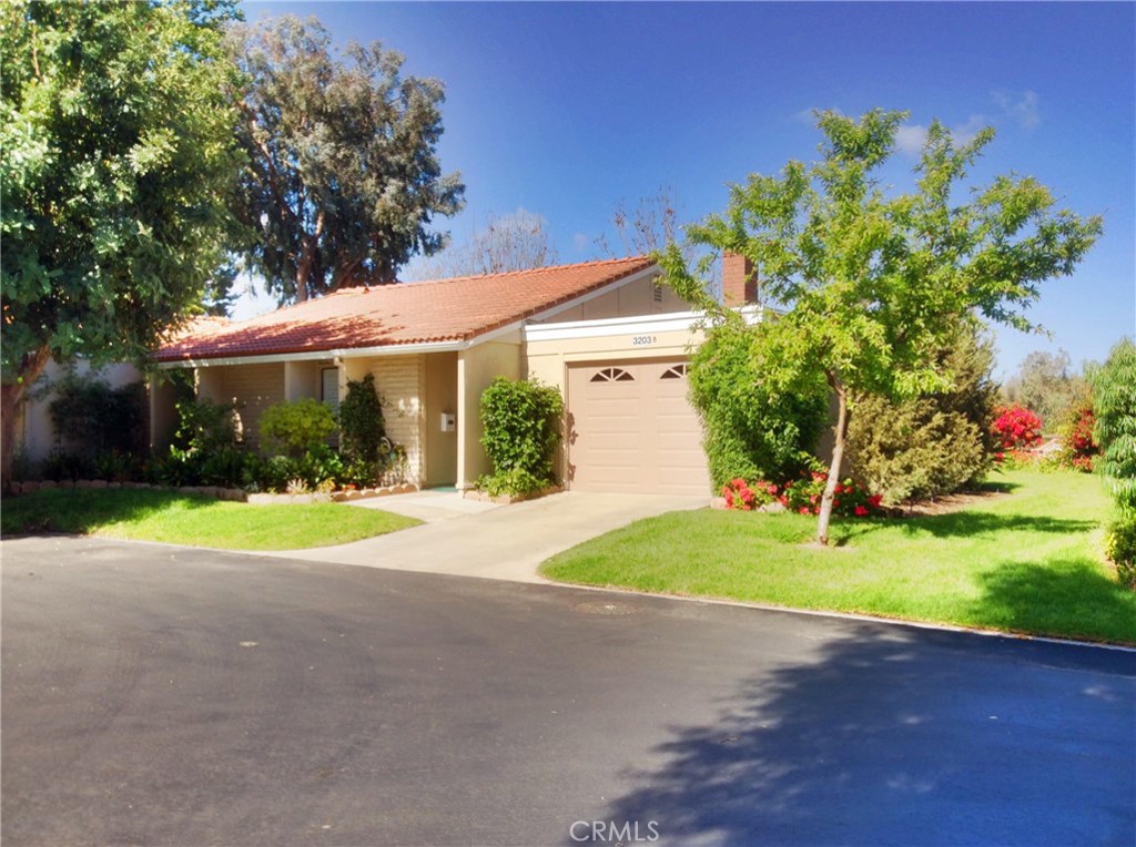 A charming Laguna Woods Patio Home With Single attached Car Garage. Open layout floor-plan; Nicely Redone Kitchen With Refaced Cabinets, Granite Counters in bathrooms ,smooth Top Electric Stove. Lots Of Newer Fixtures. Generous Sized closets and Extra Closet Space In hall way. Spacious Covered Patio For a lovely outdoor Space. Refrigerator included