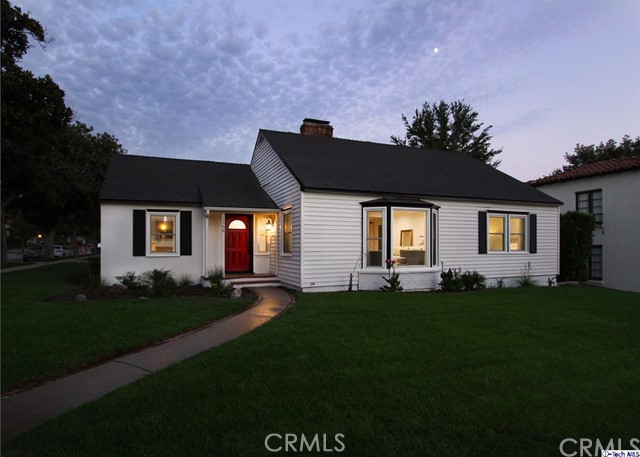 Warm, beautiful and bright! This stunning 4bed/3bath charmer leaves no detail spared. Features include: custom-built sliding barn doors, designer baths, hardwood flooring throughout, NEST thermostat, NEW roof, NEW plumbing and NEW 200 amp electrical panel to name a few! The layout flows seamlessly and features an oversized gourmet kitchen adorned w/ quartz counter tops, farmhouse sink and stainless steel appliances. You'll cozy up with a book in front of one of the multiple fireplaces or throw movie / game nights in the huge lower level family room! In the evenings, dine al fresco on your custom built redwood deck and escape to the master retreat which boasts a walk in closet and a luxe spa-like bath. All situated in one of the most sought after neighborhoods of Glendale and within close proximity to schools, shopping and dining nearby!