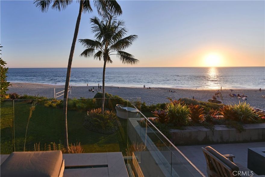 The pinnacle of Oceanfront Luxury! This immaculate estate boasts massive panoramic whitewater, coastline, and Catalina Island views. 9 Lagunita features 6 bedrooms, 6 bathrooms, 6,101 square feet of living space, and an expansive 8,670 square foot lot, all situated along 74ft of pristine oceanfront. Nestled in a serene alcove on world-famous Victoria Beach, this magnificent retreat has lush landscaping, a massive estate-style private greenbelt overlooking the ocean, and direct beach access. Designed by famed architect Ed Lorbach, the Contemporary Balinese design is flush with thoughtful details such as generous use of Honduras Mahogany and limestone, Venetian plaster walls, stunning custom bathrooms, multiple bi-fold doors for true indoor-outdoor living, a private pool & spa, and a large pitched skylight to invite the famed California sunshine inside. The gourmet chef’s kitchen features top-of-the-line appliances, custom-panel refrigerator & dishwasher, and sweeping whitewater views. Working from home is a delight thanks to the spacious office with multiple custom built-ins. And with the home gym, you can stay fit without leaving paradise. As one of only two homes in a gated cul-de-sac, privacy and parking are never in short supply. Don’t miss your opportunity to experience the peak of coastal Southern California living! This home must be seen to be believed.
