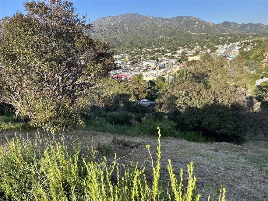 Situated in Tujunga on a 4,486SqFt lot, this land offers an ideal canvas for realizing creative visions. Unimproved and positioned just three lots away from neighboring homes, it boasts a stunning city view. The 30-degree slope is perfect for those envisioning a home designed to capture scenic vistas.