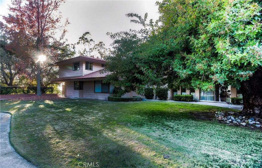 Prestigious 24-hour guard gated Bradbury Estate. Breathtaking Park like hills with both city light and mountain views. Gracious living space, huge living room, formal dining room, family room, library and 4 suites. 3 car garage attached, tennis court, pool, walking trail, lots of fruit trees. Guest house with 1 bedroom, family room, 1 bath and 2 car garage detached. Property sold "AS IS" land value only. This property is one of the best views lots behind the Bradbury Estate with a 360 degree of views of city lights and mountains, and lots of flat area to live in or build your dream estate.