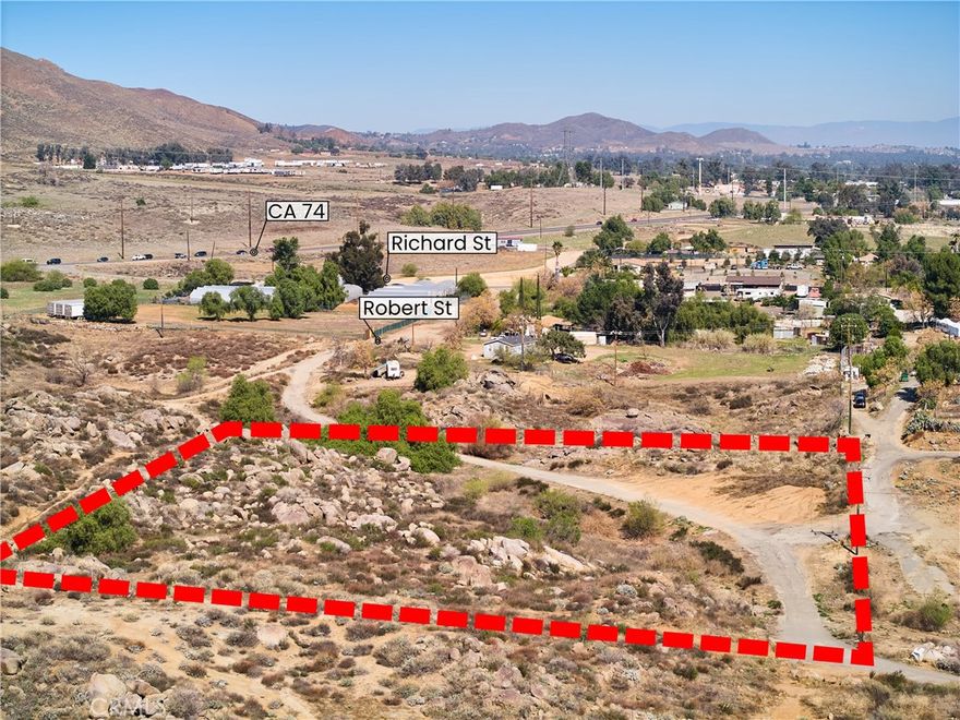 2.31 acre lot close to Hwy 74. Plenty of room for new manufactured Home or stick built home. This lot borders The lots that front Hwy 74. Lots of potential. Power and water are on the lot line.