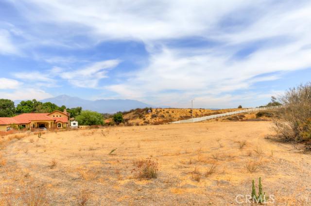 Build the custom home you are dreaming of on this 1.9 acre view lot located within Oakmont Estates (Lot 21). Large graded pad with surrounding land for privacy. Ready to build, utilities to lot , streets and curb/gutter are in. Quiet corner of two cul-de-sac streets. One share of water stock included.