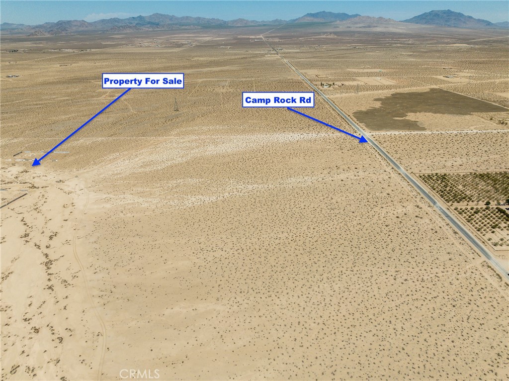 ***WATER WELL INSTALLED!** **REDUCED PRICE!** Almost 40 acres on the east side of Lucerne Valley with a WATER WELL! This property is just off paved Camp Rock Rd and only 15 minutes from the center of town for amenities. This property might make a great camp site as you are just down the street from the popular off roading area known as Cougar Buttes and only 20 minutes away from the the King of the Hammers racing grounds! The property is zoned rural living which provides a variety of uses for the land and the water well was drilled within the last 3 years. Think of all the things you could do with a large piece of land WITH WATER. Build a beautiful custom home right in the middle, build a family compound, start a farm or a ranch, grow a fruit orchard, etc. There are numerous options with this property. The seller has reduced the price to sell! Drive by today and bring your offer!
APN# 0452-132-08-0000
Coordinates: 34.486617 / -116.864686