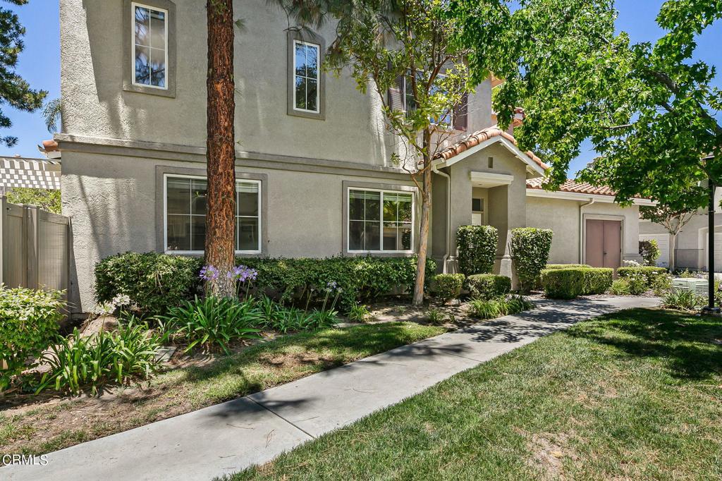 This Mission Oaks Townhome in the Los Arboles neighborhood is move-in ready and won't last long! This 3 bedroom 2.5 bath end unit home has new appliances, new carpet upstairs, newer hard surface flooring downstairs plus baseboards and crown molding, recessed lighting, newly painted interior, ceiling fans, A/C, and garage storage racks. The owner's suite offers double sinks, an oversized tub and shower plus walk in closets. You also have an attached 2 car garage with laundry and a private backyard with no rear neighbors! HOA includes Pool/Spa, Clubhouse, Playground and RV Parking. You can't beat this location with easy freeway access and walking distance to some of the best schools in Ventura County!