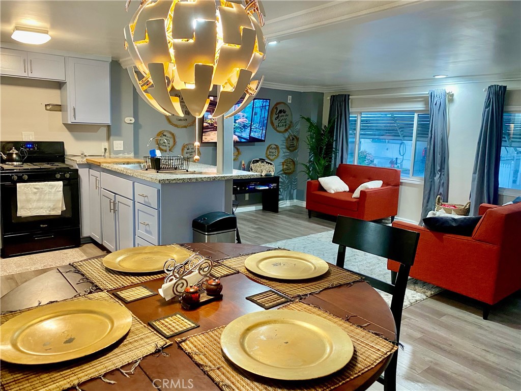 A MUST SEE! Don’t miss this incredible opportunity to own a beautifully remodeled mobile home in the desirable city of Colton! This move-in-ready gem boasts luxurious quartz countertops, stylish kitchen cabinets, and sleek laminated flooring throughout, offering both modern elegance and everyday comfort. The open and inviting layout is perfect for relaxing or entertaining, while the prime location puts you just minutes away from schools, parks, shopping centers, and dining options. Whether you're a first-time buyer, downsizing, or looking for a smart investment, this home delivers unbeatable value. Homes like this don’t last long—schedule your showing today before it’s gone!