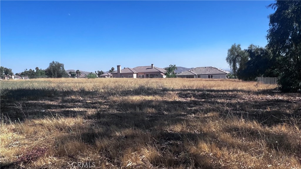 1.67 AC flat lot next to luxury single-family homes. Per seller, it can be built multi homes or units. The buyer must verify with the city. The APN number is 474-170-008 without the actual address. The vacant land is behind 11530 Kitching St., Moreno Valley, CA 92557.