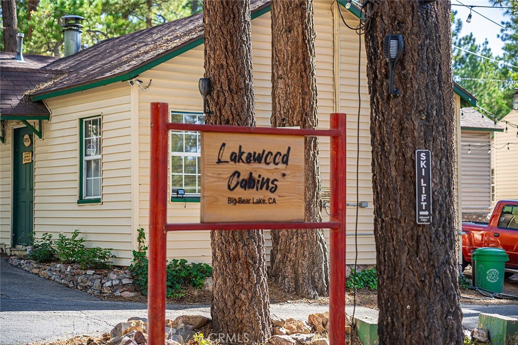 10 stand-alone Lakewood Cabins by Big Bear Lake features approximately 4,852 square feet of Professionally Designed/Remodeled Hotel/Motel/Airbnb investment opportunities inside approximately one acre of wooded area with tall pine trees and picnic area. Minutes away from Big Bear Village restaurants, shops and Ski Resorts. Over $300,000 recent upgrades on 7 one bedroom cabins and 3 studio cabins which include fully equipped kitchens, Living rooms, bathrooms, water heaters, new floorings, split-unit AC systems, and 2 Tesla/EV charging outlets. Newly upgraded items also include Electric panels, August Smart door locks for all units, and a new Wi-Fi system covering inside and outside seating area. Fire pits, BBQ grills , Kids playground, picnic tables and chairs are located in the open area. One On-site Manager cabin servicing all 9 cabins. Ample parking spaces and one acre lot offers possible expansion. The conveyance consists of six parcels. Easy access to Highway 18 and 330.